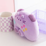 Quarter side view of the Pusheen Gamer Plush. The controller inspired plush is longer than deep to mimic a real gaming controller. 