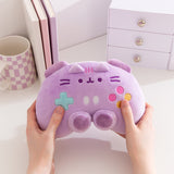 Model holding light purple Pusheen gaming controller plush to show size and scale of the plush toy.
