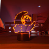 Orange LED light shaped with a crescent moon, star, and Pusheen the Cat wearing headphones.