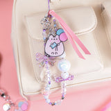 Festival phone charm attached to a white bag. The wristlet has a mix of light purple, light pink, light blue, and white beads alternating on the entire string.