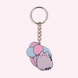 Pusheen 15th Anniversary Keychain on a flat background. The pastel-colored keychain has silver outlines. 