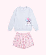 Light blue sweatshirt with Pusheen the Cat character printed on the wearer's left side. The pink shorts in the set have an all over print of Pusheen with pastel balloons. 