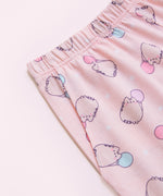 A close-up view of the elastic band on the Pusheen pajama shorts and one of the side pockets on the side of the shorts. 