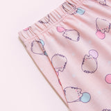 A close-up view of the elastic band on the Pusheen pajama shorts and one of the side pockets on the side of the shorts. 