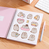Full view of the Pusheen stickers included in the Pusheen planner. The stickers show Pusheen by herself and with her siblings and friends.