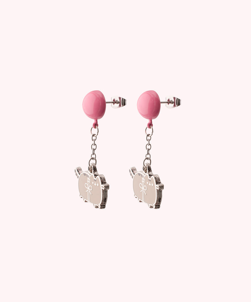 Back view of the Balloon Dangle Earrings on their backer card. The back shows the cggcw branding and SalesOne manufacturer branding. The backs of the Pusheen earrings can be seen in this view and shows Pusheen logo is shown on the back of the silver earrings.