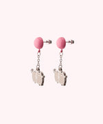 Back view of the Balloon Dangle Earrings on their backer card. The back shows the cggcw branding and SalesOne manufacturer branding. The backs of the Pusheen earrings can be seen in this view and shows Pusheen logo is shown on the back of the silver earrings.