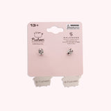 Back view of the Balloon Dangle Earrings on their backer card. The back shows the cggcw branding and SalesOne manufacturer branding. The backs of the Pusheen earrings can be seen in this view and shows Pusheen logo is shown on the back of the silver earrings.