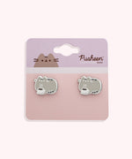 Pusheen the Cat earrings on a pink and purple backer card. The grey cat has darker gray stripe details on the cat body while Pusheen's eyes, mouth, and whiskers and the same silver as the outline. 