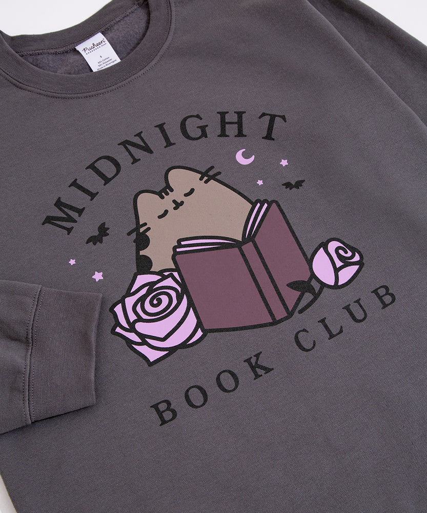Gray sweatshirt with Midnight Book Club text and Pusheen the Cat hanging on a hanger on a white background.