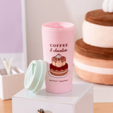 Sweets Travel Mug with the screw-top lid next to the cup. The light pink interior color matches the exterior pink color. 