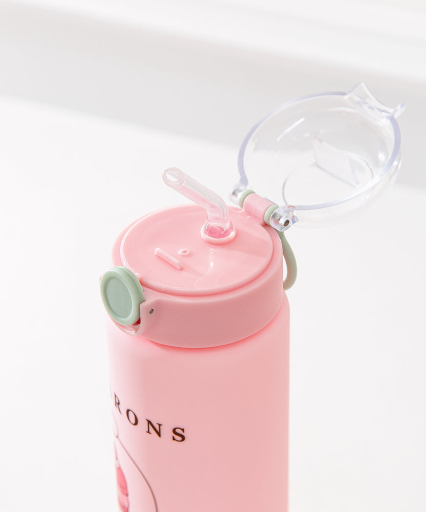 Pink pusheen water bottle is a vertical graphic down the center back of the Sweets Water Bottle. Pusheen transforms into light pink, white, green, and medium pink macarons. 