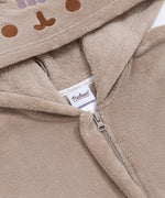 Close-up of a zipper and cggcw tag on the Pusheen Kigurumi.