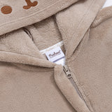 Close-up of a zipper and cggcw tag on the Pusheen Kigurumi.