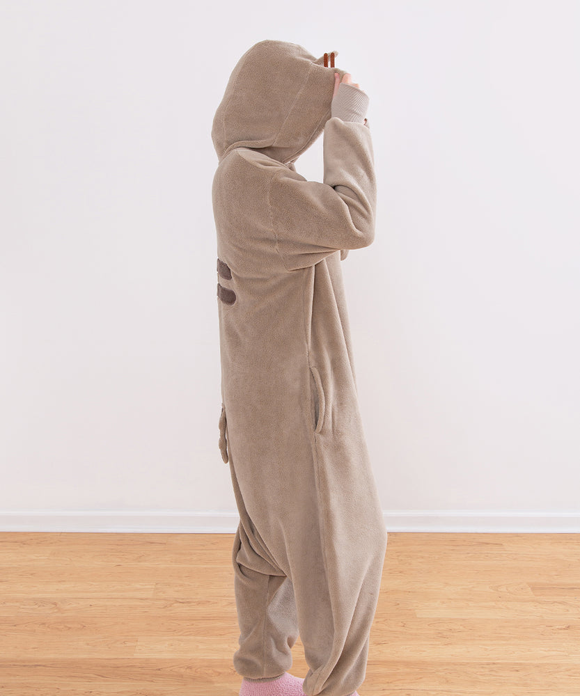 Model standing to the side while wearing the kigurumi onesie to show silhouette of fleece costume.
