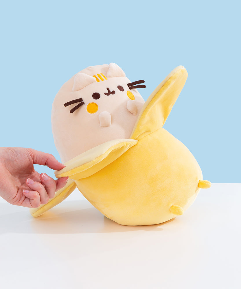 Model holds down one portion of the banana peel edges to show the adjustable nature of the peels.
