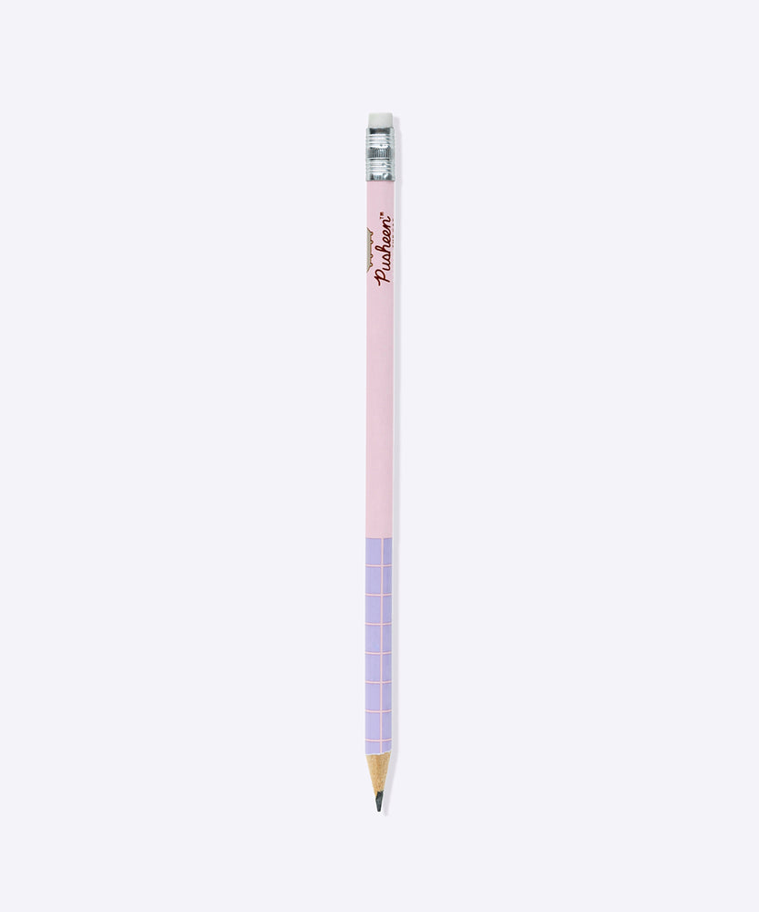 Close-up of the included pencil that comes with the notepad. The two-toned pink and purple pencil has a grid pattern near the sharpened edge and an eraser on the other end. 