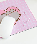 Close-up of water droplets sitting on top of the mouse pad to demonstrate the fabric's waterproof feature.