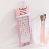 Pastel colored Pusheen nail stickers. The sticker set includes ice cream, cupcake, pizza, stars, and more decals. 