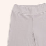 Close-up view of the Pusheen legging’s wide waistband. The taupe-colored loungewear bottoms have a thick band at the top for a comfortable fit.  