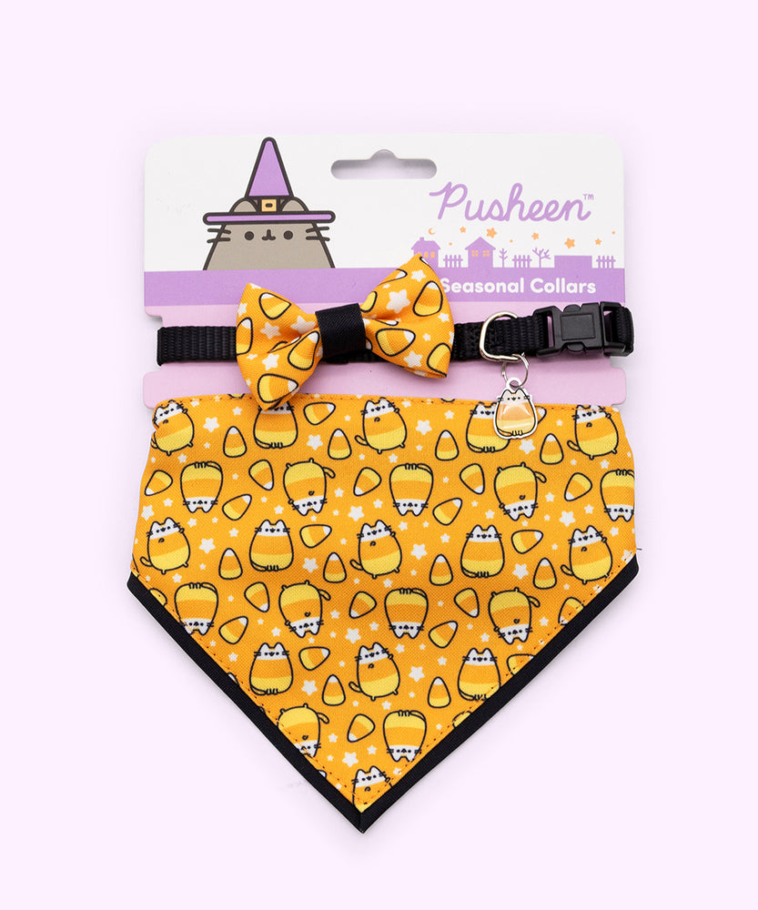 Pusheen Halloween Candy pet collar and bandana set in packaging that states that the set are seasonal collars. The bowtie and bandana graphics are displayed at the front. 