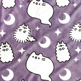 Close-up of the Halloween Ghost Pet Blanket. The soft purple fleece has graphics of Pusheen the Cat, Stormy, and Pip as white ghosts.