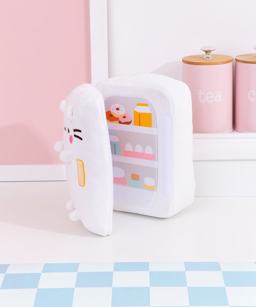 Back view of the Pusheen's Kitchen Refrigerator Plush. Pusheen's striped tail extends off the bottom back of the plush and alternates between white and light pink colors.