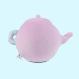 Back view of the Pusheen's Kitchen Teapot Squisheen Plush. Looking at the back, the lilac colored tea kettle lid and pour spout can be seen as well as the mint green and lilac striped handle extending off the round plush body.