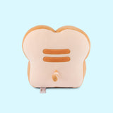 Back view of the Pusheen's Kitchen White Bread Squisheen Plush. The back of the bread slice plush features Pusheen's two back stripes that matches the light-brown color of the side of plush. Towards the bottom of the plush is Pusheen's striped tail alternating the colors of light cream and light brown.