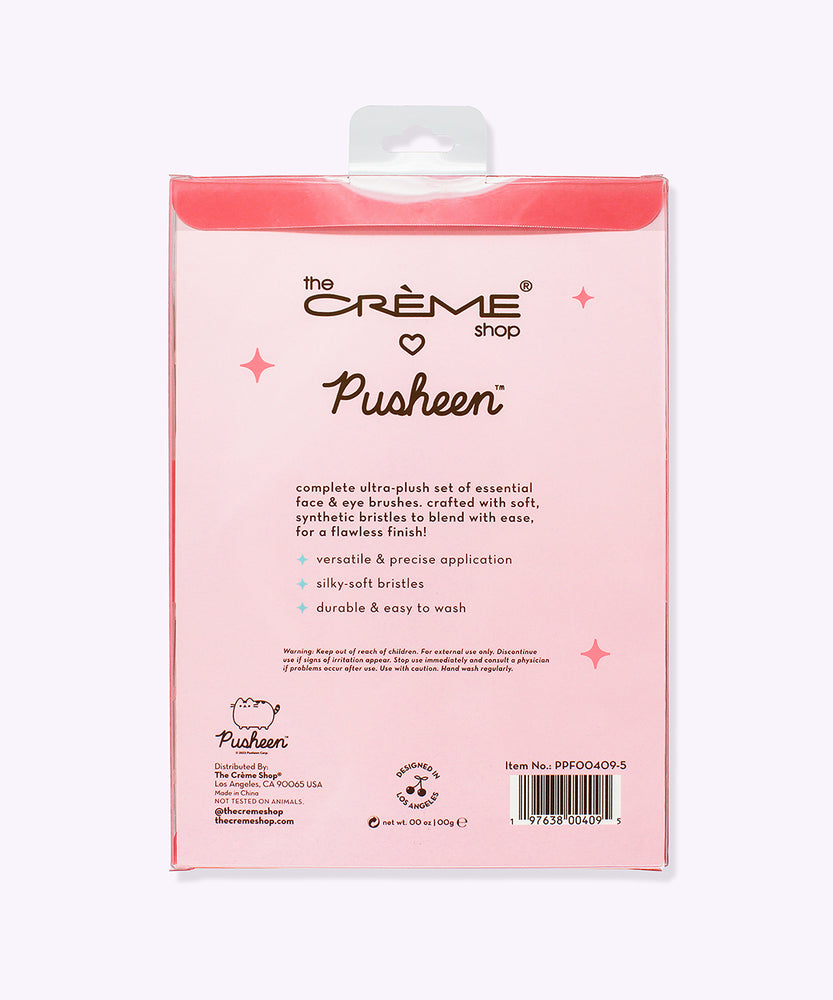 Back view of the makeup brush set packaging. The back of the pink box includes products highlights and The Creme Shop and Pusheen logos.