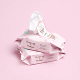 Side view of The Creme Shop x Pusheen Cleansing Towelettes - 2-pack. The light pink packaging has a resealable flap on the top for easy towelette extraction.