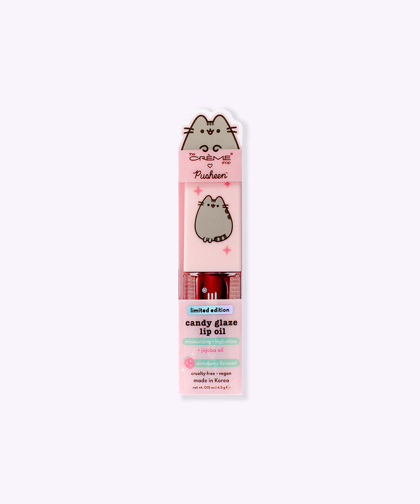 Berry Best Pusheen Lip Oil in its packaging. The front includes product details like the strawberry flavoring, and that the oil is vegan and cruelty-free.