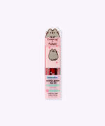 Berry Best Pusheen Lip Oil in its packaging. The front includes product details like the strawberry flavoring, and that the oil is vegan and cruelty-free.