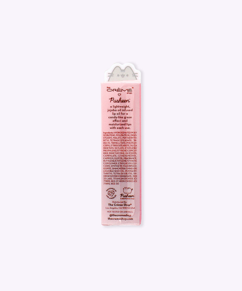 Back view of the Berry Best Pusheen Lip Oil. The back includes ingredient information as well has instructions for how to use the product.