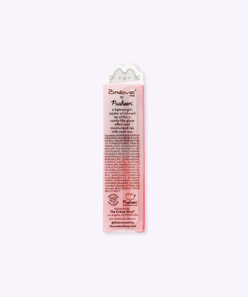 Back view of the Twinkle Star Pusheen Lip Oil. The back includes ingredient information as well has instructions for how to use the product.