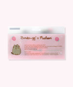 Back view of the packaging for the Pusheen Spa Headband. The back includes Pusheen logos and graphics as well as how to care for the item.
