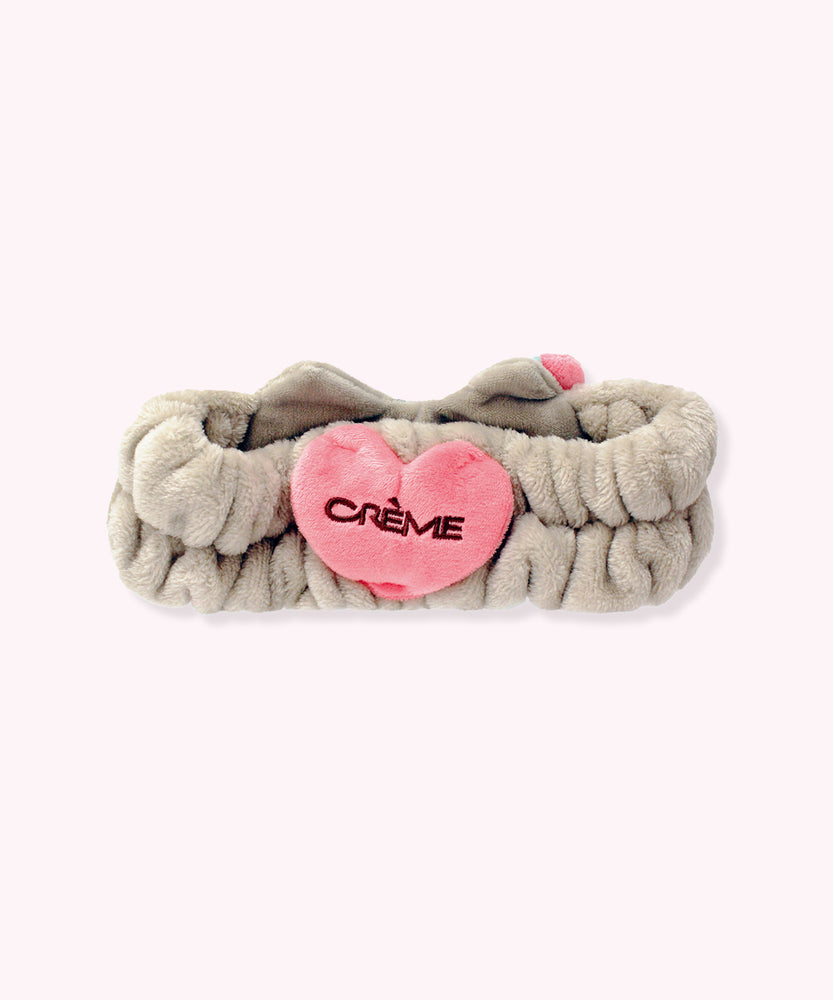 Back view of the packaging for the Pusheen Spa Headband. The back includes Pusheen logos and graphics as well as how to care for the item.