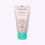 Back view of the hand cream tube. The bottle has a product description telling the user that the cream with help nourish and moisturize their dry skin.