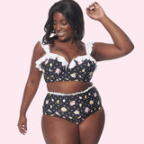 A different model wears the Pusheen Swimsuit. The swim top has a bra-top fit.