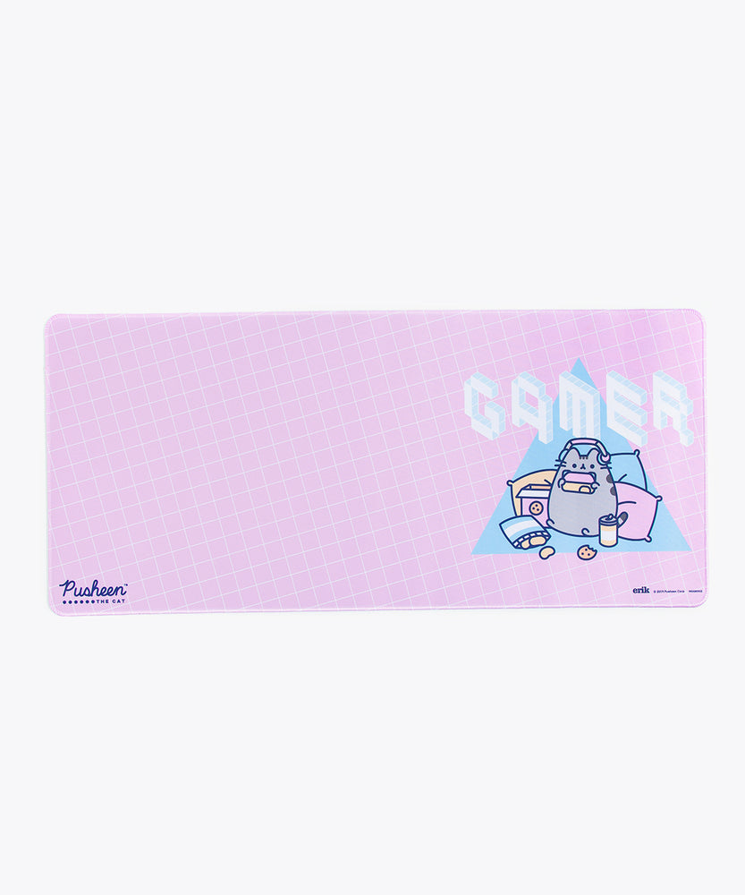 Close up of the Pusheen the Cat Logo on the lower left side of the Gaming Desk Mat. The edges of the mat are sewn, and the rubber base is partially visible.