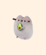Back view of the plush shows Pusheen’s classic back stripes and striped grey tail.