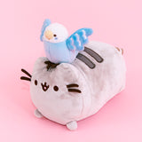 Full quarter view of the Bo and Pusheen plush in front of a pink background.