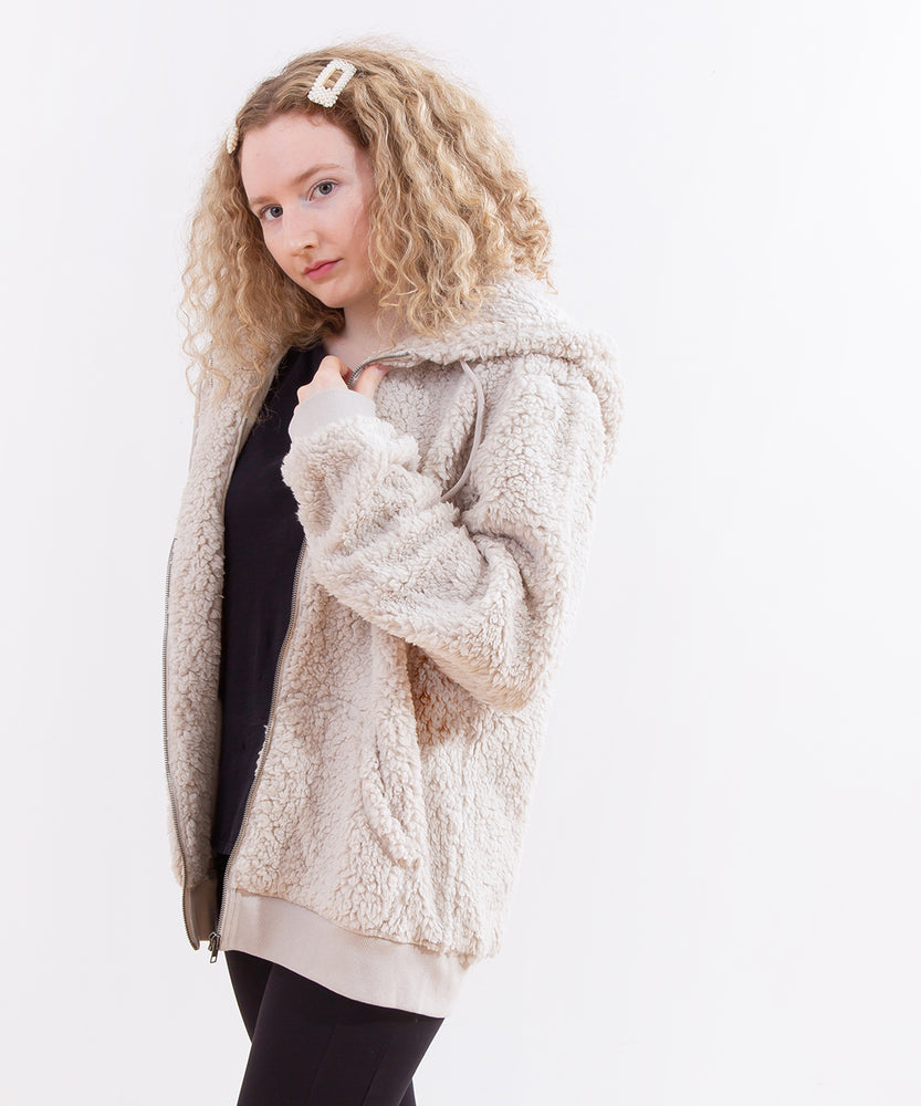 Model wearing the Pusheen Character Hoodie, unzipped and hood down, in front of a white background.