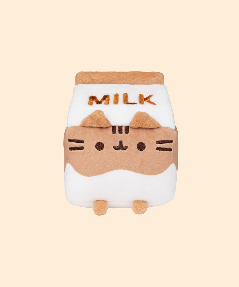 Front view of the Chocolate Milk Sips Plush in front of a yellow background. 