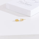 Front and side view of the Pusheen Lazy Stud Earrings in gold vermeil. One earring faces forward while the other faces the side to showcase the earring bar and backer mechanism.
