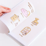A model holding the book open in front of a white background, showing off the pages featuring a two-page comic of "Pusheen's Guide to Hiding Places."